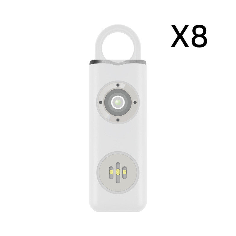 Safety alarm keychain attached to bag
